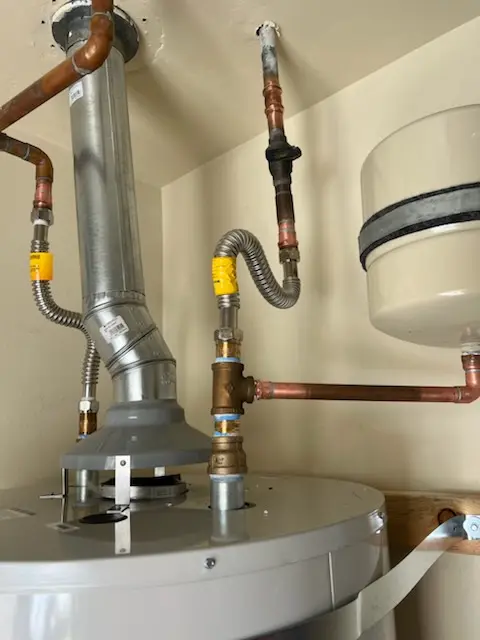 Water heater installation and plumbing repair in Sheds